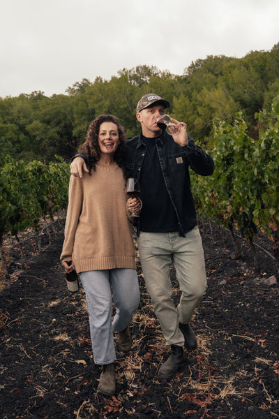 Monica & Beno Stewart of Catch & Release Wines in an Organic Gamay vineyard in California