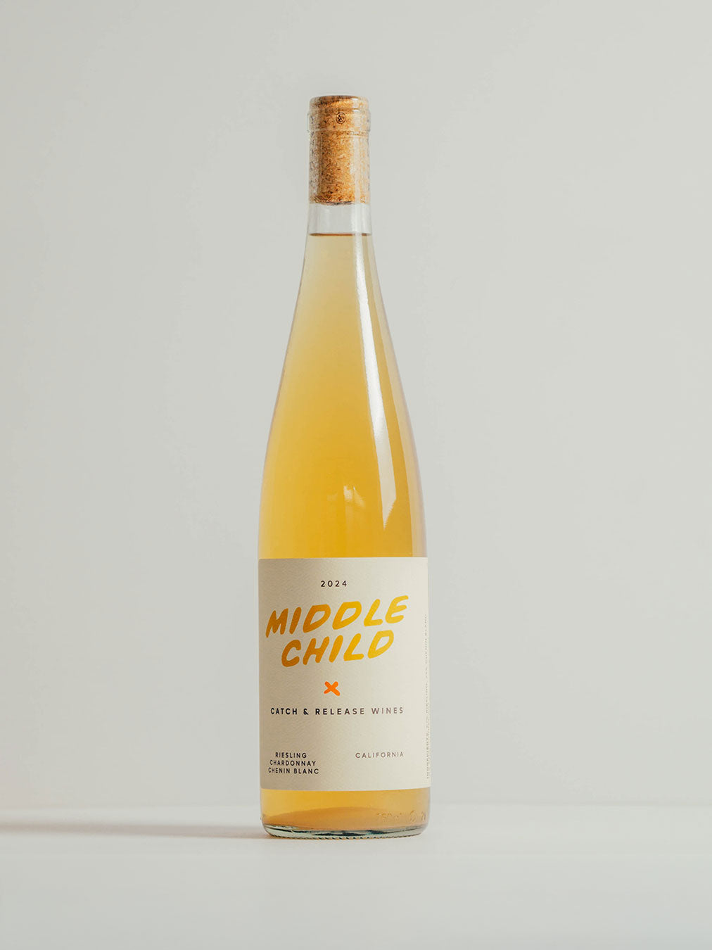 Catch & Release California Natural Wine skin-contact Riesling 2024 Middle Child bottle shot front on grey