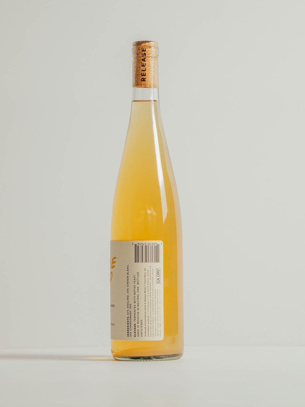 Catch & Release California Natural Wine skin-contact Riesling 2024 Middle Child bottle shot side on grey