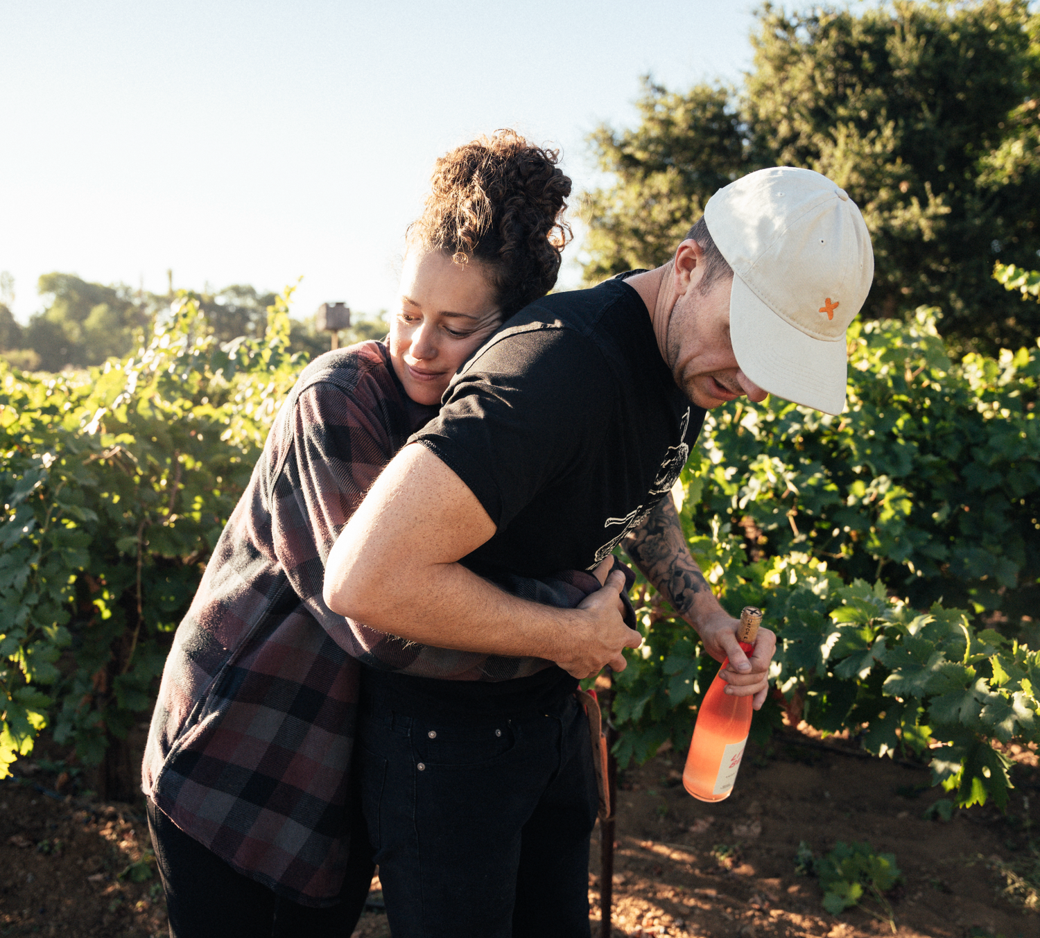 Beno & Monica Stewart of Catch & Release Wines holding organic Zinfandel Rosé