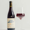 Catch & Release Wines 2022 Lite Weight bottle shot on grey front with glass of wine next to it