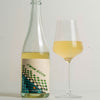 Catch & Release Wines California Natural Sparkling Wine bottle with glass of wine poured