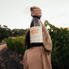 Catch & Release Natural Wine biodynamically farmed Pinot Gris bottle shot in the vineyard