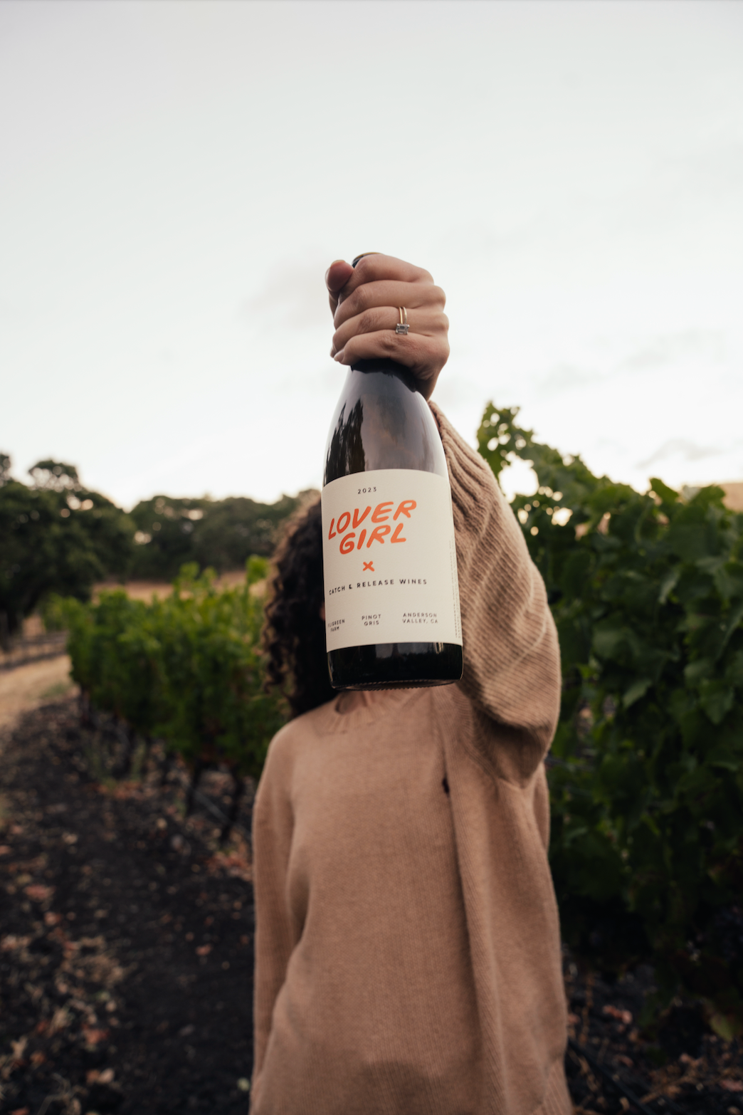 Catch & Release Natural Wine biodynamically farmed Pinot Gris bottle shot in the vineyard